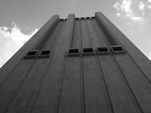 scavengedluxury: 33 Thomas Street, New York. This mysterious windowless edifice is in fact a telecom exchange. It’s off Broadway a few blocks North of City Hall Park. The streets around it were deserted which added to its general vibe of serene menace.