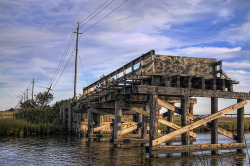 fuckyeahnj:  Manahawkin, NJ: “Bridge to Nowhere”  One of my most favorite places on the planet. I have many fond memories of standing on this bridge at a very young age, freezing my hands off and watching silhouetted short-eared owls skim the marsh.