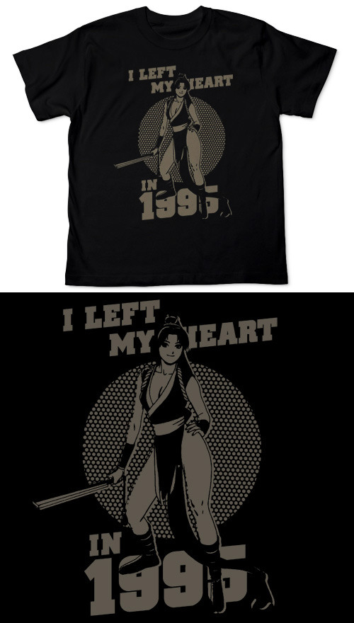 “I Left My Heart In 1995”/Mai Shiranui shirt (click for a larger image). If you have a particular fondness for The King of Fighters ‘95 – or just 1995 in general* – Cospa will happily sell this black tee to you at its Tokyo Game Show booth for...