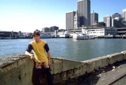 Hung guy showing off in front of the SF Ferry Building.