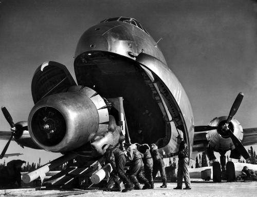 Douglas C-124 Globemaster II personnel unloading B-50 Superfortress’ P&W R-4360-35 Wasp enginephoto by Margaret Bourke-White, Strategic Air Command Thule AFB, Greenland April 1951