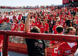 inothernews:  REMEMBRANCE; DEFIANCE   Fans and fellow students observe a moment of silence for Tyler Clementi before Saturday’s football game between Rutgers and Tulane.  (Photo: Branch Price / New York Daily News) 