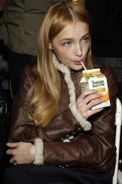 Lookin chic with her orange juice.