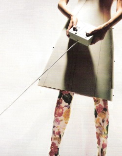 Hussein Chalayan dress and Kenzo tights by