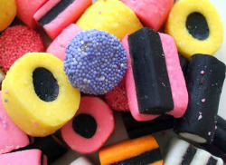 Rianb:  Liquorice Allsorts Coconut Circle, Sugar-Dotted Anise Jelly Button, Three-Layer