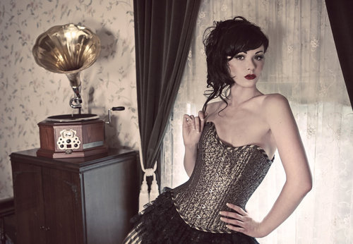 melissaajayne:  a record player, and a corset. two of my favorite things in one picture! 