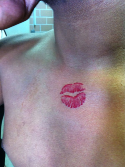 My homeboy got his girl’s lips on his chest