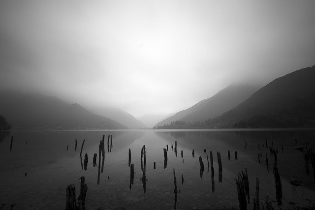 black-and-white:  Remains of world’s oldest houses on stilts (by Kees Smans) 