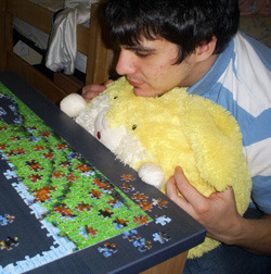 rabbithugs:  this is not actually a photograph of me but it could really pass for one, right down to the crushing sense of loneliness  me completing my autism puzzle with my squishables rabbit