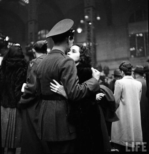 Soldier hugging his wife goodbye at Penn Station before he leaves for war. New York, 1944 [From the 