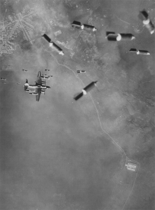 xplanes:
“ “This picture, snapped on a mission by Martin B-26 Marauders against a German troop concentration West of Velletri, shows a narrow escape by one of the medium bombers from the explosives of its own formation..”
(see also)
”
This is an...