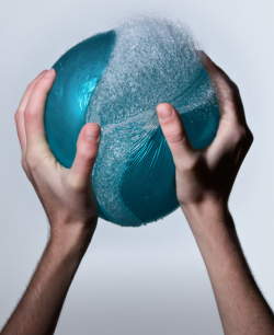   A water balloon as it ruptures. 