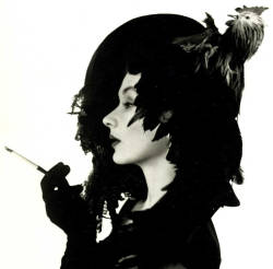 Hotparade:  Irving Penn - Woman In Chicken Hat (Lisa Fonssagrives-Penn), New York,