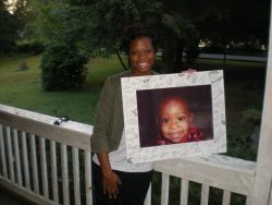 goldendreamsdiamondthoughts:  This right here is who I call my Big Sis Zakkiya.  she’s holding a picture of her son Devon.  God called Devon to be with him late August of this year.  he was only 10 months old.  =( … I want you to please pray for