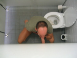 gloryhollelujah:  on his knees in a stall doing what a cocksucker does best. 