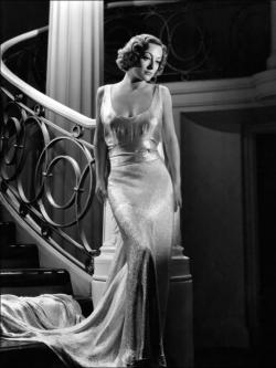 hedda-hopper:  theclutteredclassicattic:  Joan Crawford in I Live My Life (1935)  [Gowns in the movie designed by Adrian] 