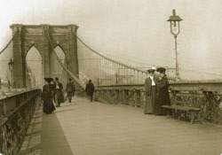 ratak-monodosico:  The Brooklyn Bridge: not always so beloved September 8, 2009 Well-dressed men and women circa 1890, suspended between the city of New York and the city of Brooklyn. Judging by all the smoke in the background, it looks like the camera