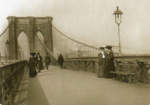 ratak-monodosico:  The Brooklyn Bridge: not always so beloved September 8, 2009 Well-dressed men and women circa 1890, suspended between the city of New York and the city of Brooklyn. Judging by all the smoke in the background, it looks like the camera