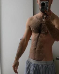 filthyandanonymous:  This guy’s build and body hair rock my socks. Go otters! 