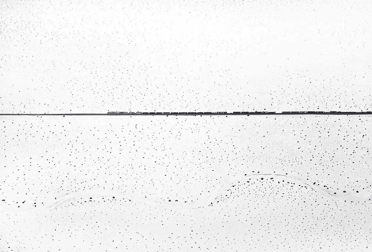 Train Crossing the Dessert, Kelso, California photo by William A. Garnett, 1974