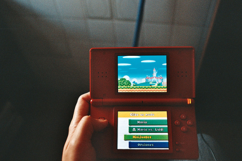 I have this game and I love it! And my DS is red too! :D