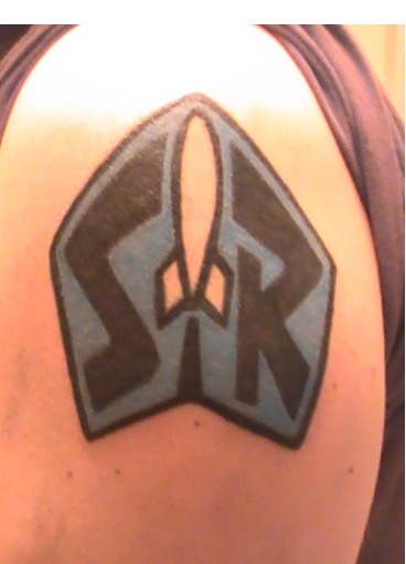 m3lo:  fuckyeahtattoos:  its buzz lightyear’s space ranger patch from the pixar classic Toy Story. since the age of three when i first saw that film, i knew it was my destiny to become part of that team. i am now a freshman in college with a major in