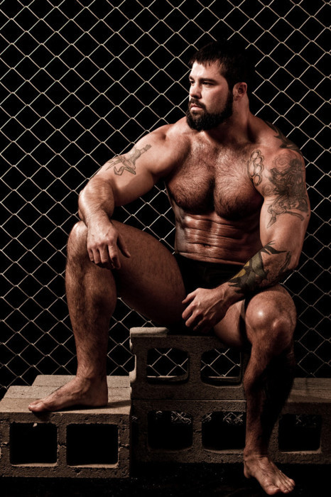 From Muscle Man Hideaway… a great combination of fur, tattoos, muscles and a beard.