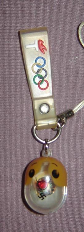 cloesy:  This is my wonderful phone strap thing, it has a swastika on it lmao 