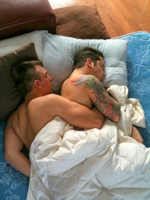 Cute gay guys cuddling