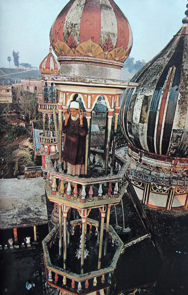 A muezzin calling the faithful to prayer from the Chandanpura Mosque in Chittagong,