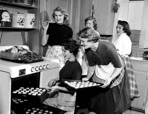 stuffaboutminneapolis:Women baking and eating cookies, Minneapolis (1954) via Minnesota Historical S