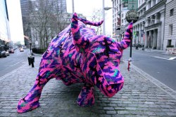 thedailywhat:  Street Art of the Day: For her latest urban intervention, Polish-born, NYC-based artist / guerrilla knitter Agata Olek (AKA Crocheted Olek) yarnbombed the bejusus out of the Wall Street Bull. [animalny.]  Badass