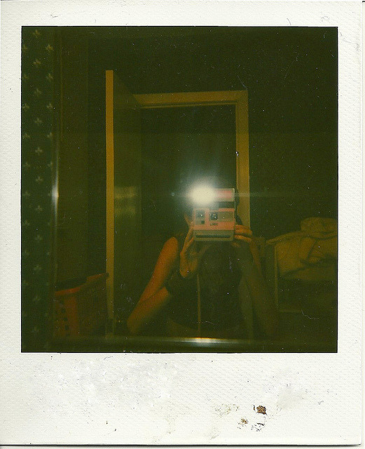 6.4.09 Baby’s first Polaroid: A self-portrait.
Growing up, I did not possess a Polaroid camera. I believe the film was dubbed too expensive, and while I did have one of those trendy Polaroid sticker cameras I never did get to have that experience of...