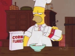 Homer Simpson trying to make cereal and failing