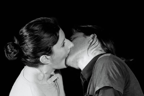 skinned-teen:  Marina Abramovic and her lover/collaborator Ulay performing “Death Self”. (This performance consisted of the two artists seated in front of each other, connected at the mouth. They took in each other’s breaths until all of their available