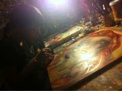 ivylise:  Watching my tatunga paint.  :)
