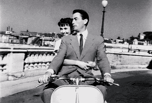 theniftyfifties:Gregory Peck and Audrey Hepburn go for a ride in ‘Roman Holiday’, 1953. *gif*