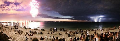 beatspm:   This was taken in Australia. Three separate things happening at once: On the left, fireworks exploded as part of Australia Day celebrations. In the middle, it’s Comet McNaught. Then on the right, there’s lightning from a thunderstorm far