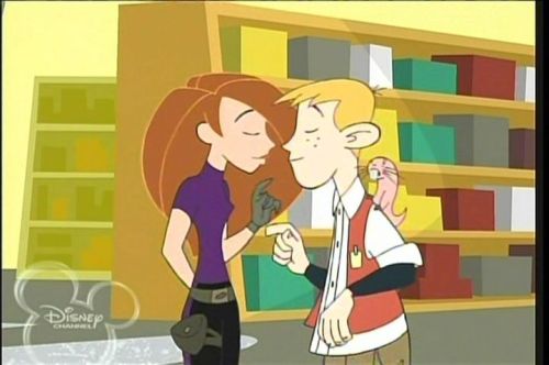 Kim Possible and Ron Stoppable about to kiss in...