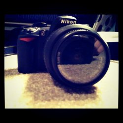 Nikon D3100//my baby. =D haha