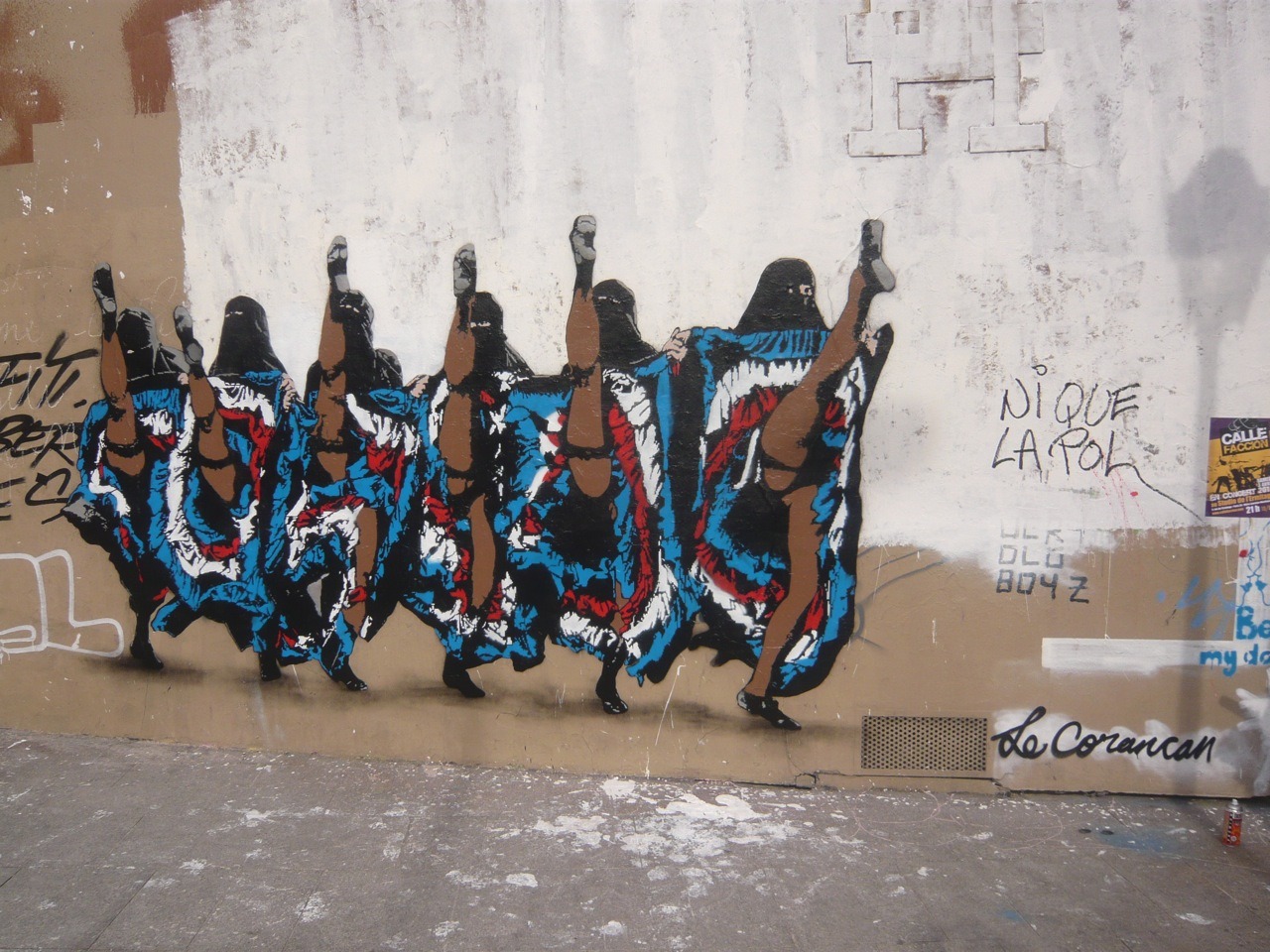 Nick Walker. British artist spray painting controversial stuff on walls in Paris.