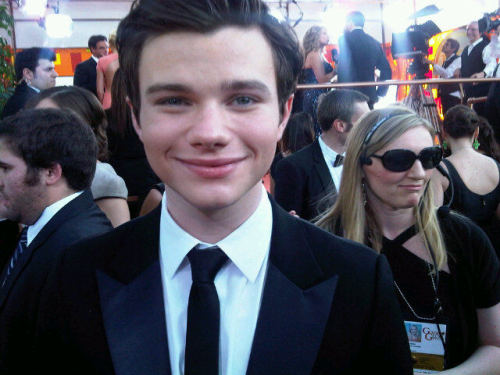 homemadedarkmark:  chriscolfernews:  So, so photo but he’s there :D “Chris Colfer sez “just as nerve wracking” in the 2nd time. But he notes, it’s not raining “ Source  TTTTHANKYOU 