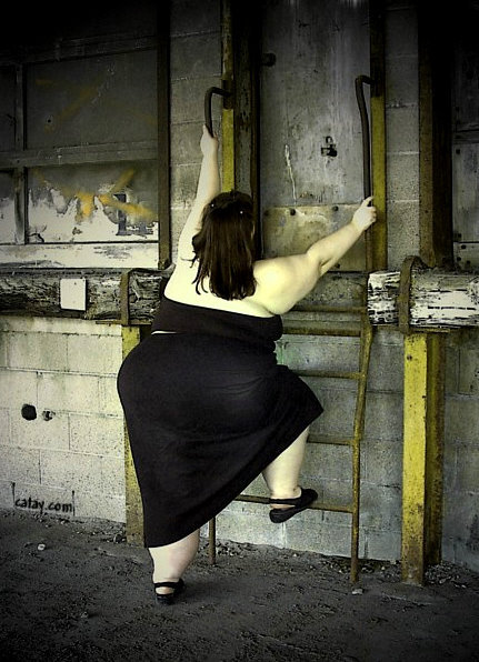 catay:  Climbing up the corporate ladder, the fat chick starts in the basement.