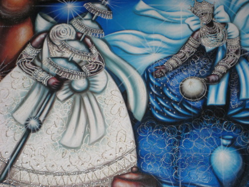 girabambola:Orixas.  I took a picture of these paintings in the market across the Elevador Lacerda i