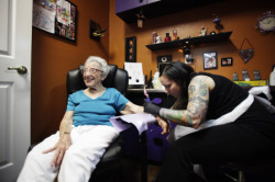 fuckyeahgirlswithtattoos:  Mimi Rosenthal, 101, is all smiles while Michelle Gallo-Kohlas tattoos a sunflower on her arm at Requiem Body Art in Spring Hill Saturday. When Rosenthal turned 99, she decided to get her first tattoo, an “itty-bitty butterfly”