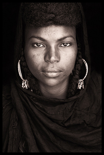 Portrait of a young Wodaabe woman with the tribe’s characteristic good looks and self-possessi