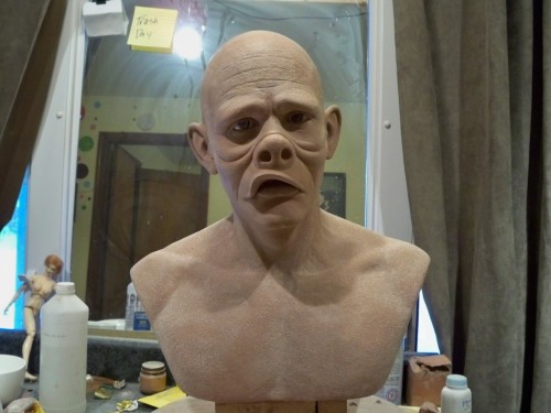 Manny Lemus FX, finished sculpt  Taking a minute to brag here, my boyfriend/fiance/lover face/best friend, is the shit.  Graduation is in 5 days. He finally finished this bust in the nick of time, AND, as you can see, he still remembers to take out the