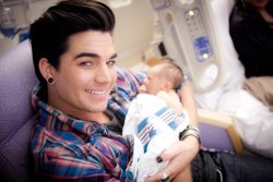 ravenclawwit:  Oh. My. God. This is so cute it kinda hurts.  WHOSE BABY THO? Also, his hair looks lovely in this picture.