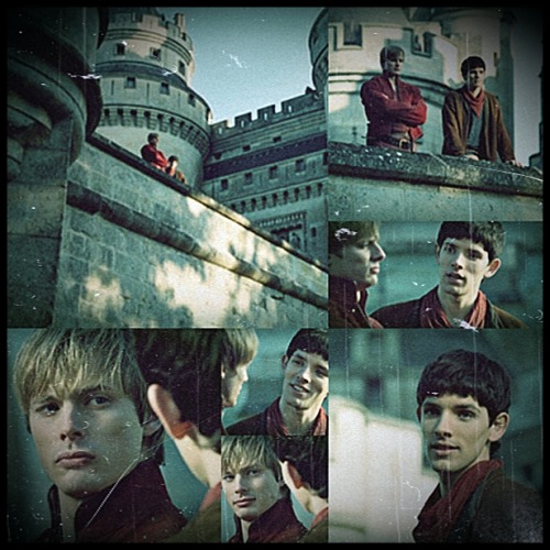 ohmycrim:Arthur, who had been looking out to sea, crossed over and stood  behind Merlin, so close th