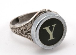 wickedclothes:  This typewriter key ring is a wonderful handcrafted oak leaf ring made with an authentic vintage typewriter key. The key was removed from a 1930-40’s era typewriter. Many different letters and symbols are available. 